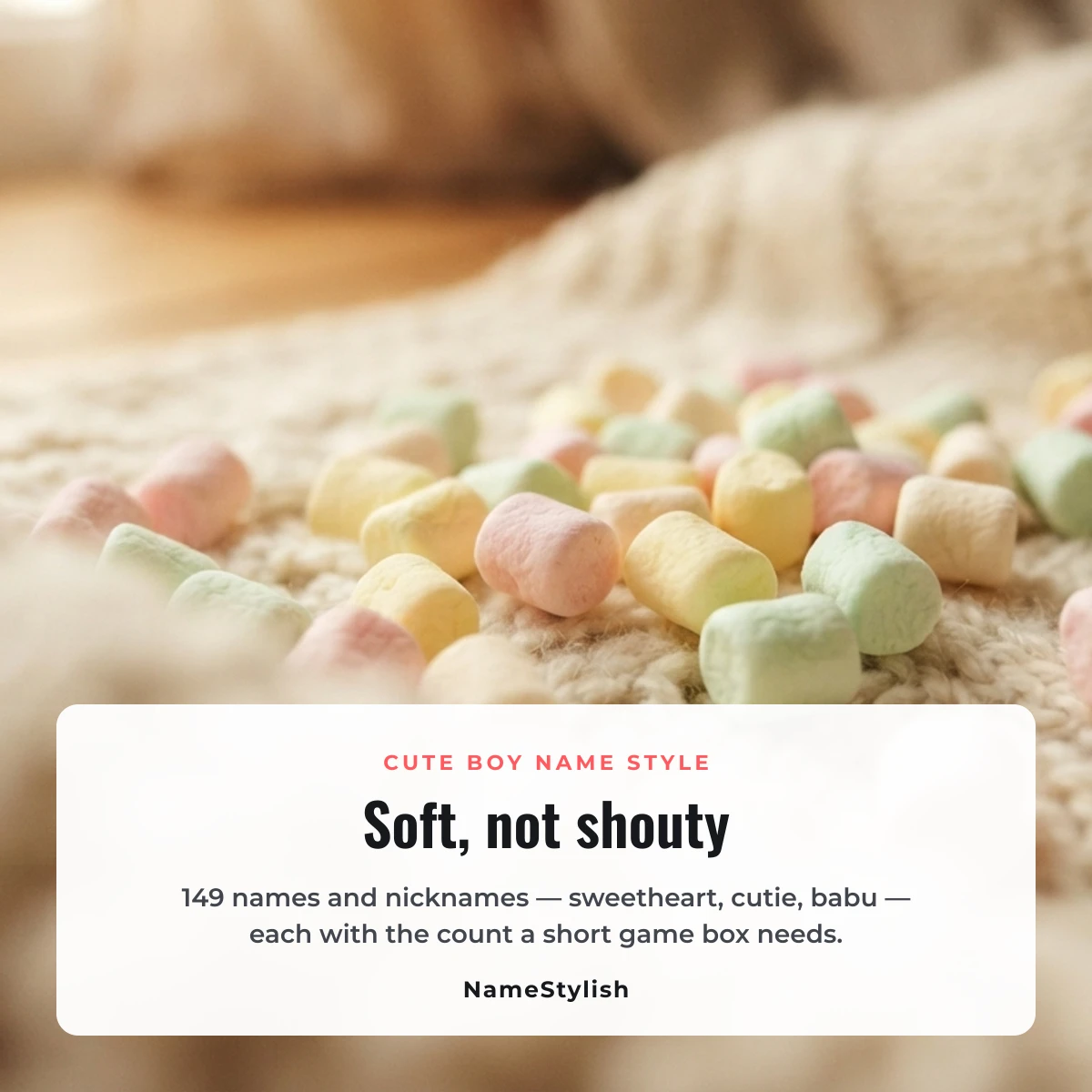 Cute boy stylish name - soft, not shouty Pastel marshmallows scattered on a cream knitted blanket beside the words cute boy name style