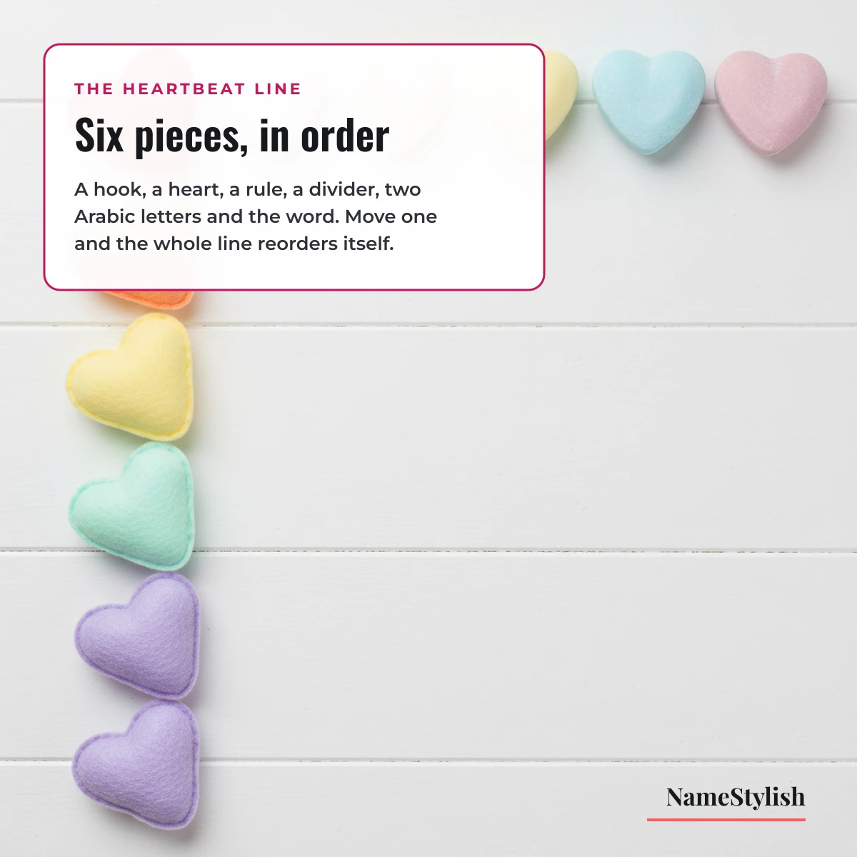 What the mom dad heartbeat line is made of Felt and candy hearts arranged in a neat row on a bright surface